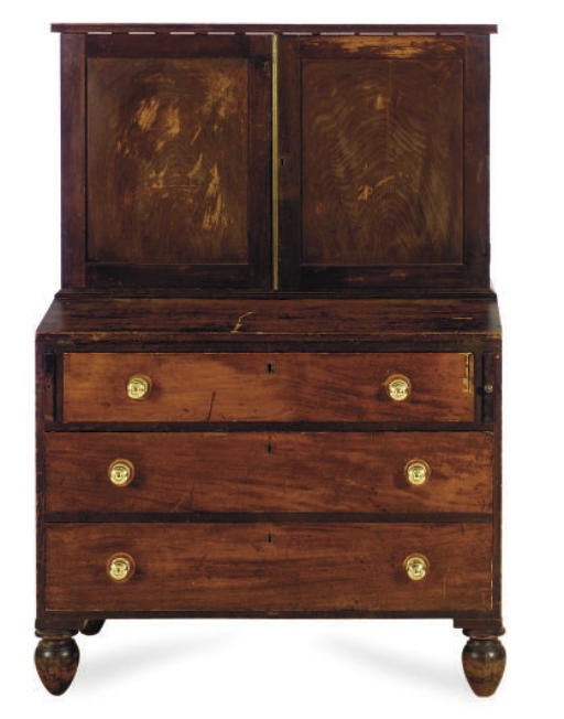 AN AMERICAN CLASSICAL MAHOGANY DESK-CABINET