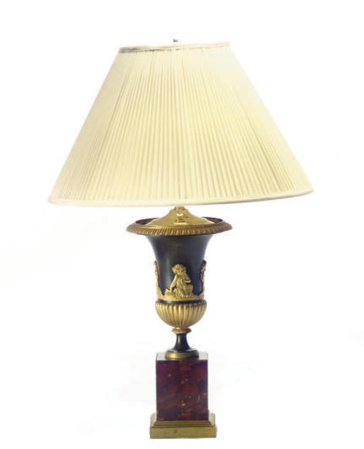 A RESTAURATION PATINATED AND GILT-METAL URN,