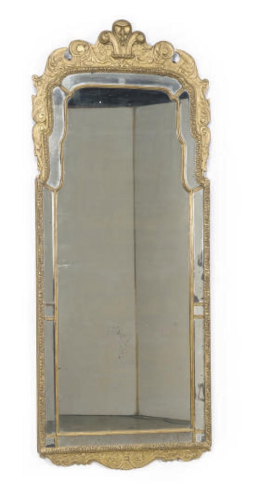 A GILTWOOD WALL MIRROR,