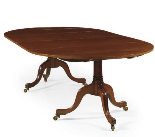 A GEORGE III MAHOGANY TWIN-PEDESTAL DINING-TABLE