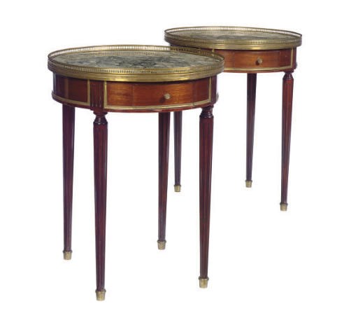 A PAIR OF FRENCH BRASS-BOUND MAHOGANY MARBLE-TOP GUERIDONS,