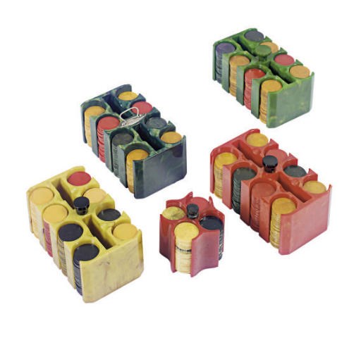 A COLLECTION OF CATALIN POKER CHIPS WITH CADDIES,