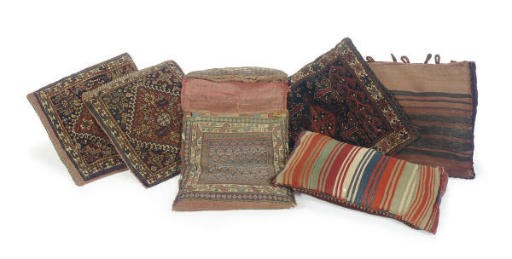 A GROUP OF WOVEN BAGS CONVERTED TO PILLOWS,