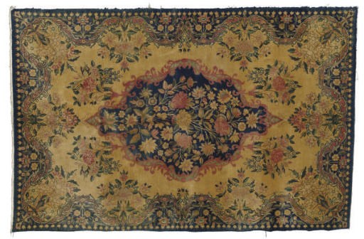 A KIRMAN RUG,