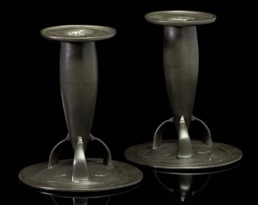 ARCHIBALD KNOX FOR LIBERTY & CO.; PAIR OF CANDELSTICKS