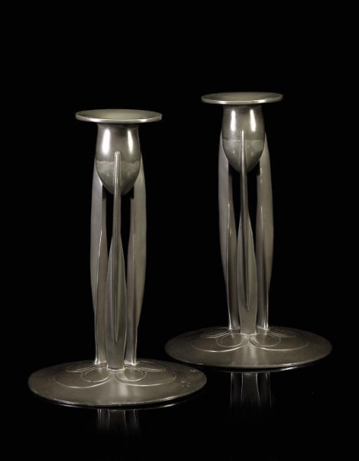 ARCHIBALD KNOX FOR LIBERTY & CO.; PAIR OF CANDLESTICKS