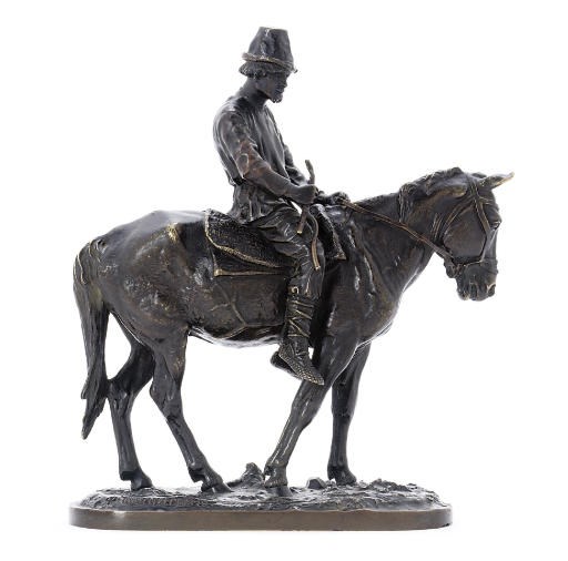 A bronze figure of a peasant on a mule