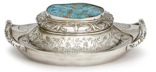 A silver and turquoise box