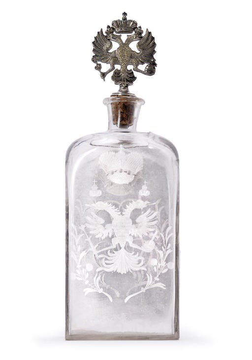 An engraved glass decanter