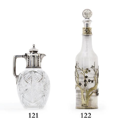 A silver-gilt mounted glass decanter