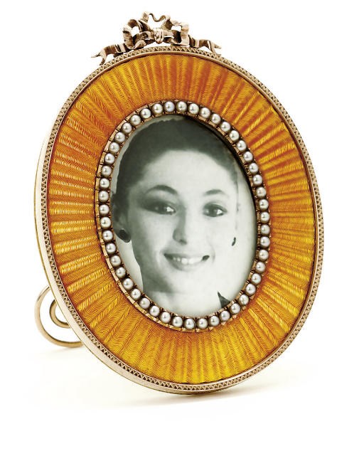 A gold and guilloché enamel photograph frame
