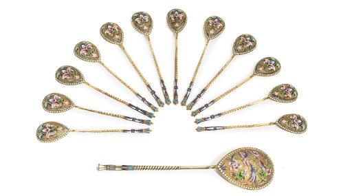 A set of twelve silver-gilt and cloisonné enamel tea-spoons and a serving spoon