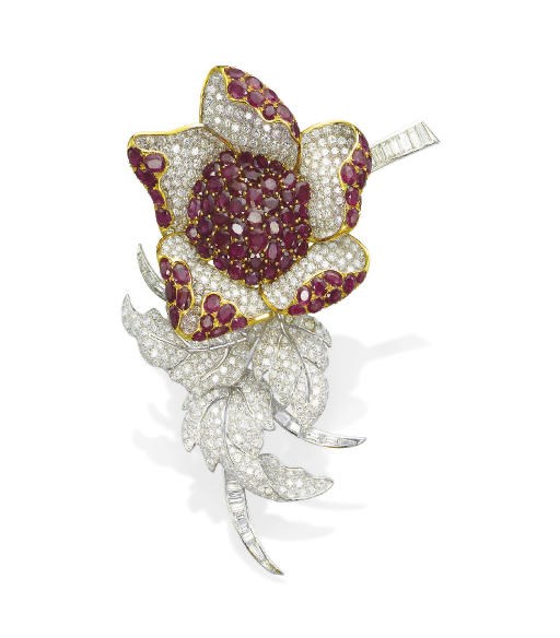 A RUBY AND DIAMOND FLOWER BROOCH