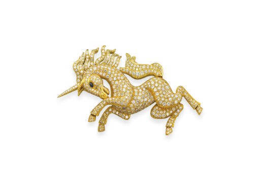 A DIAMOND AND SAPPHIRE UNICORN BROOCH, BY DEMNER