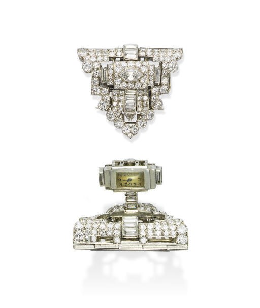 AN ART DECO DIAMOND PIN/LAPEL WATCH