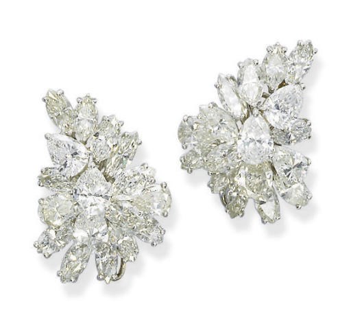 A PAIR OF DIAMOND EARRINGS