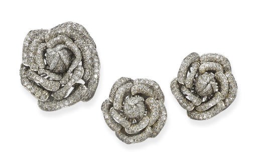 THREE DIAMOND ROSE BROOCHES