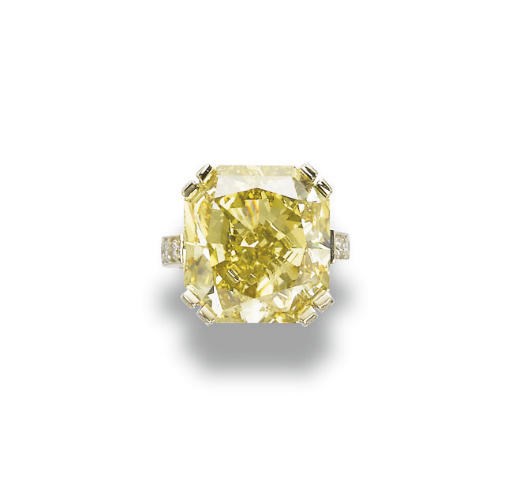 A COLOURED DIAMOND AND DIAMOND RING
