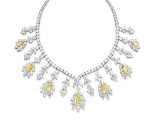 A COLOURED DIAMOND AND DIAMOND NECKLACE
