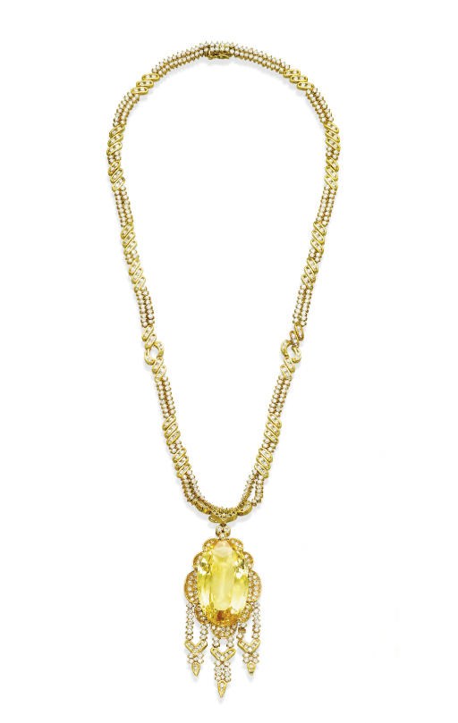 A YELLOW SAPPHIRE AND DIAMOND PENDENT NECKLACE