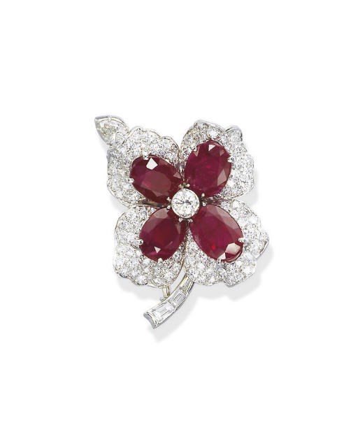 A RUBY AND DIAMOND FLOWER BROOCH