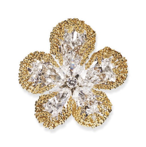 AN EXQUISITE DIAMOND AND GOLD FLOWER BROOCH, BY VAN CLEEF & ARPELS