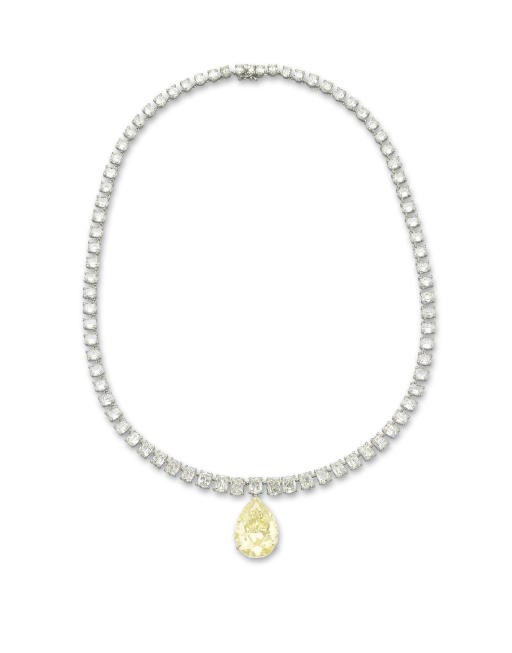 A COLOURED DIAMOND AND DIAMOND NECKLACE