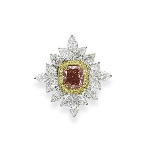 A COLOURED DIAMOND AND DIAMOND PENDANT/BROOCH