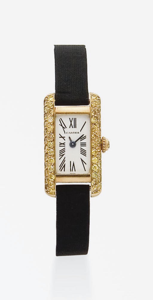 MONTRE BRACELET DE DAME "TANK" DIAMANTS JAUNES, PAR CARTIER