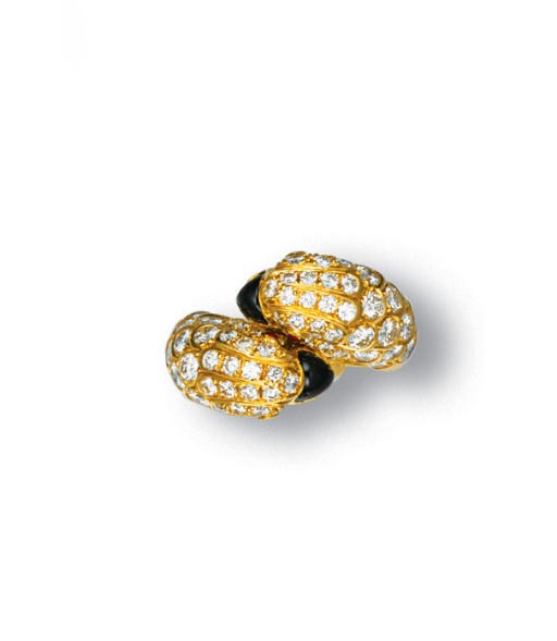 A DIAMOND, ONYX AND RUBY RING, BY PIAGET