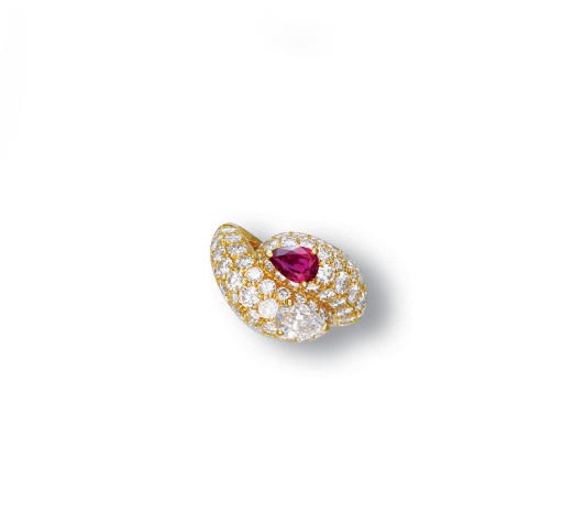 A DIAMOND AND RUBY RING, BY CARTIER