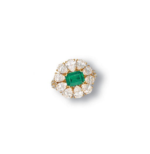 AN EMERALD AND DIAMOND RING, BY PIAGET