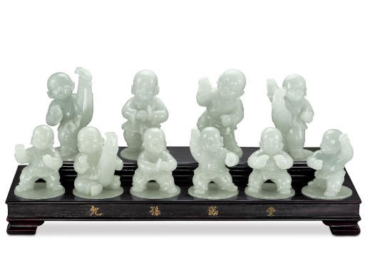 A SET OF JADEITE FIGURINES
