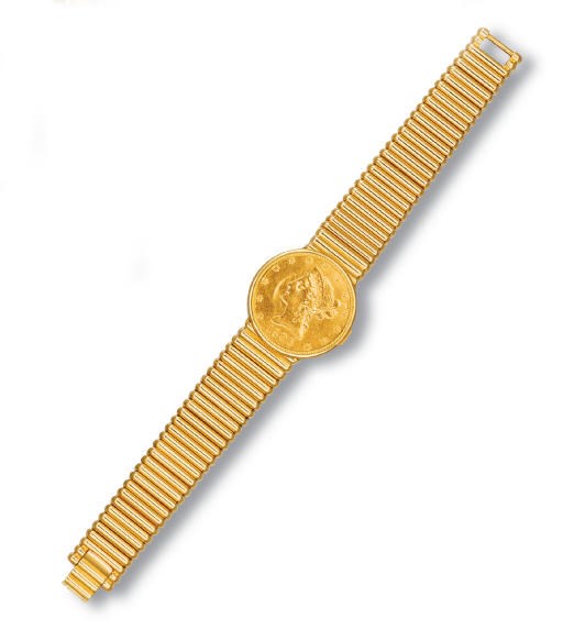AN 18K GOLD TEN DOLLAR COIN WATCH, BY PIAGET