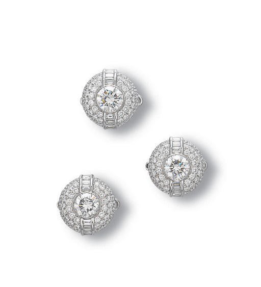 A SET OF DIAMOND DRESS STUDS