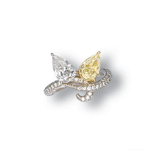 A COLOURED DIAMOND AND DIAMOND RING