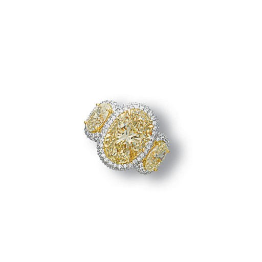 A COLOURED DIAMOND AND DIAMOND RING