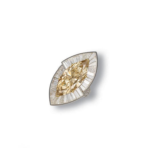 A COLOURED DIAMOND AND DIAMOND RING