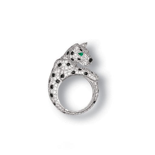 A DIAMOND, ONYX AND EMERALD 'PANTHÈRE' RING, BY CARTIER