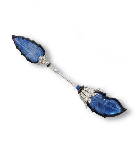 A SAPPHIRE, BLACK ENAMEL AND DIAMOND JABOT PIN