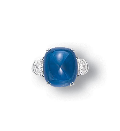 A SAPPHIRE AND DIAMOND RING