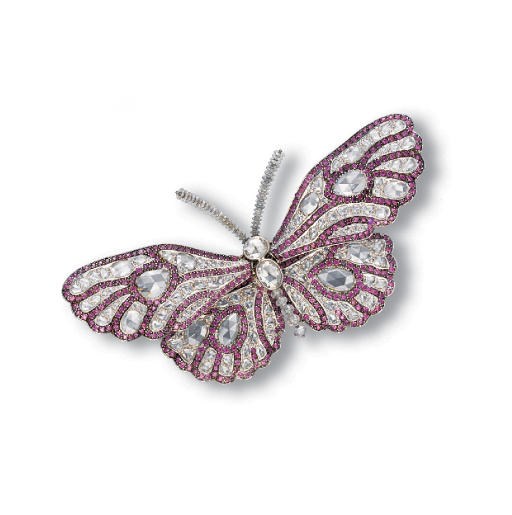 A DIAMOND AND RHODOLITE GARNET BUTTERFLY CLIP BROOCH, BY CARNET