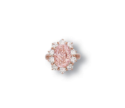 A COLOURED DIAMOND AND DIAMOND RING