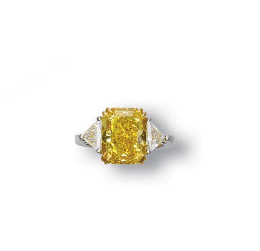 A COLOURED DIAMOND AND DIAMOND RING