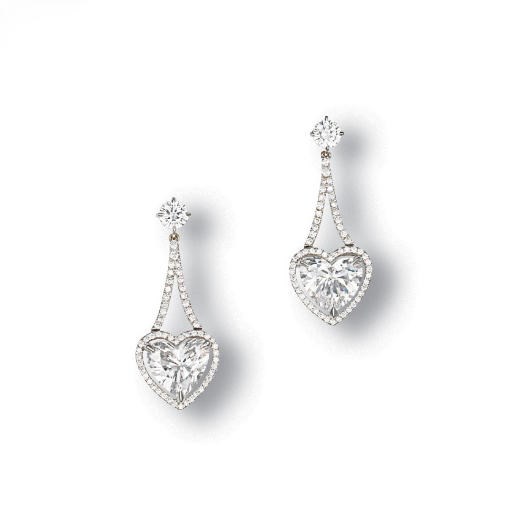 A PAIR OF DIAMOND EARRINGS
