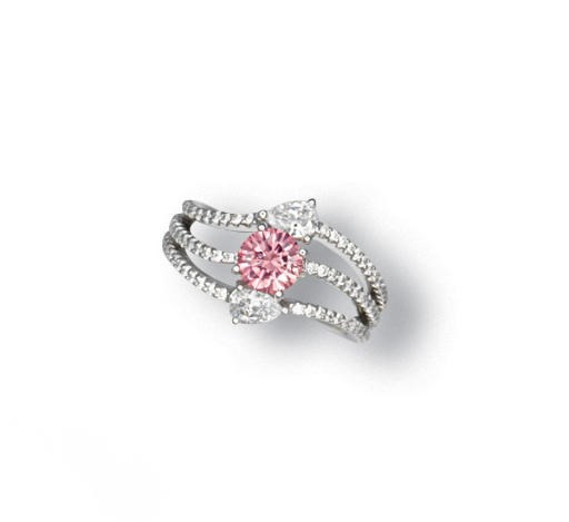 A COLOURED DIAMOND AND DIAMOND RING