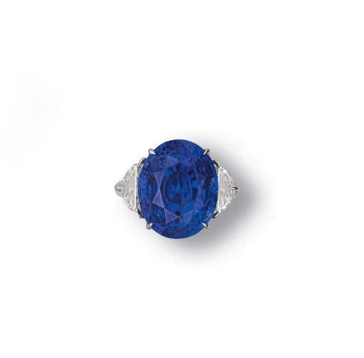 A SAPPHIRE AND DIAMOND RING