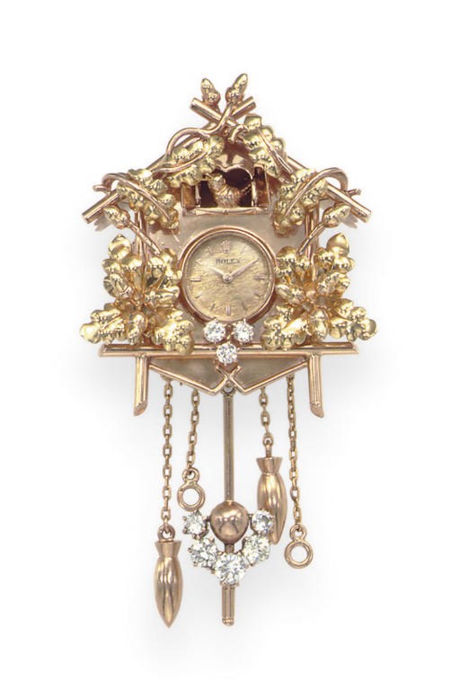 A GOLD AND DIAMOND 'CUCKOO CLOCK' BROOCH, BY ROLEX