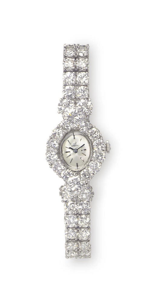 A DIAMOND WRISTWATCH, BY OMEGA