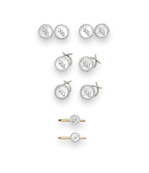 AN ART DECO MOTHER-OF-PEARL AND DIAMOND DRESS-SET, BY CARTIER